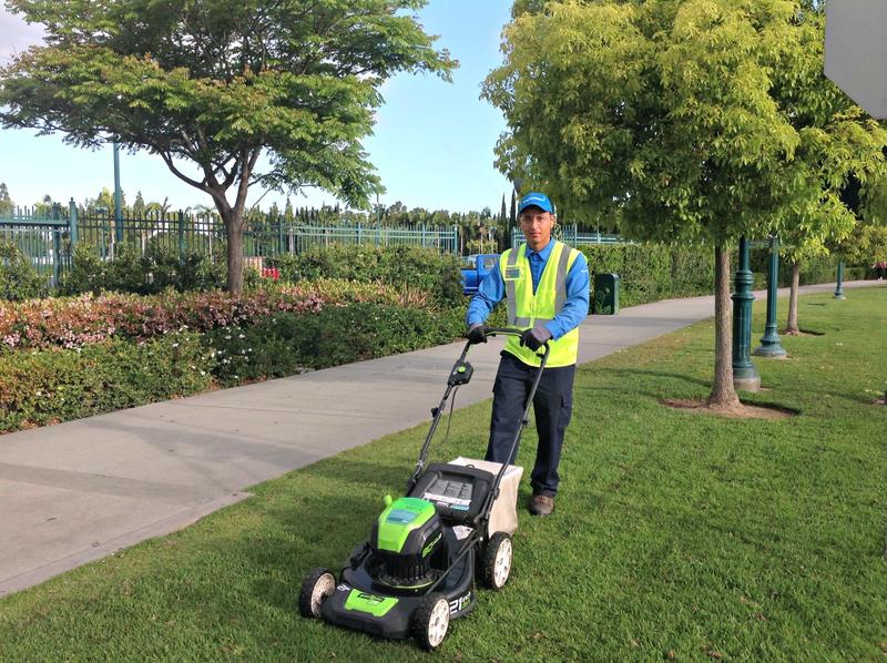 BrightView team member zero emission mower grass